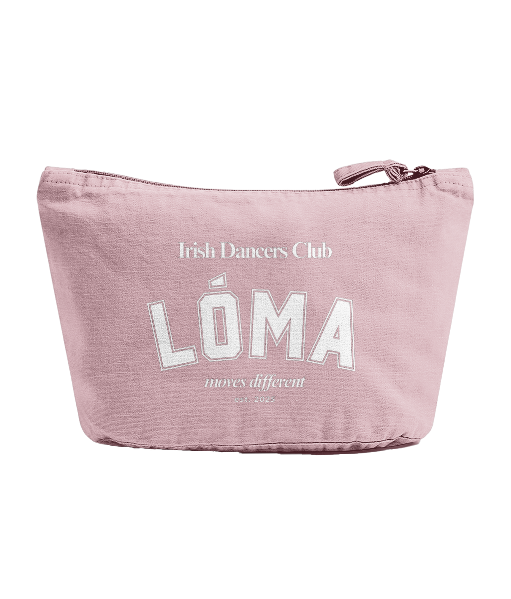 Soft washed pink recycled cotton Lóma Club Pouch featuring white varsity lettering, designed for Irish dancers to store accessories, competition essentials and everyday items.